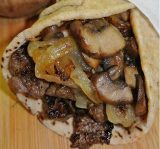 STEAK AND CHEESE SANDWICHES WITH ONIONS AND MUSHROOMS